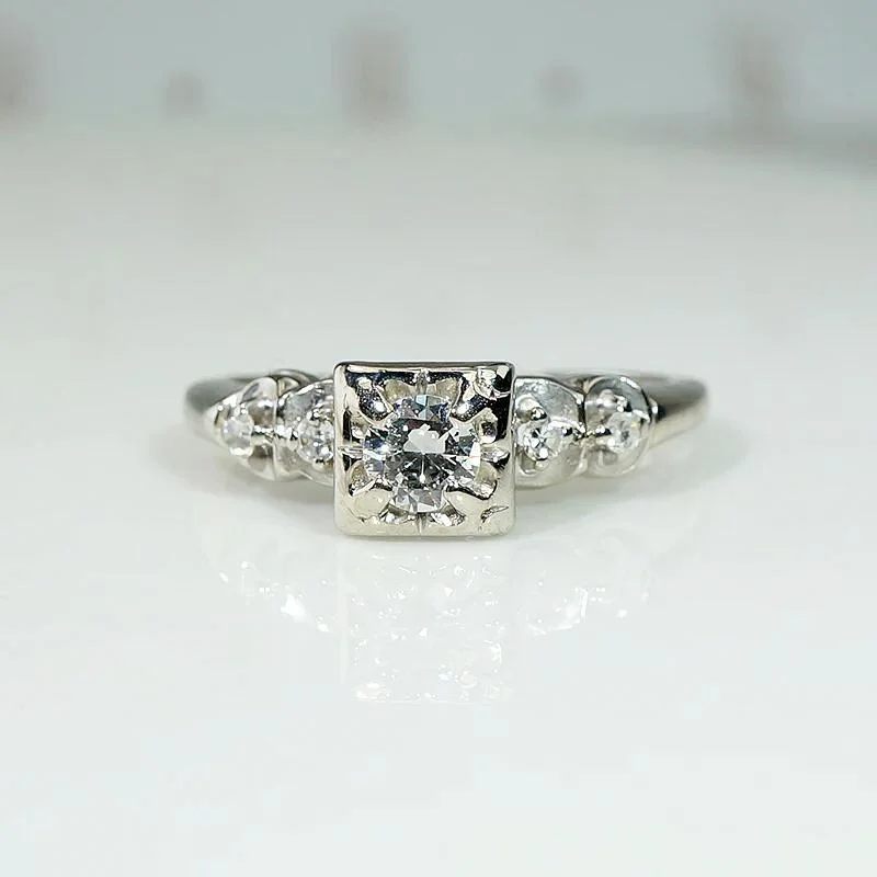 Raw gem engagement rings -Romantic White Gold Engagement Ring with Floral Details