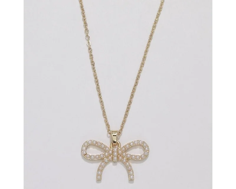 Ladies Necklaces with Cream Howlite-Periwinkle by Barlow : Delightful gold bow with pearls - Necklace