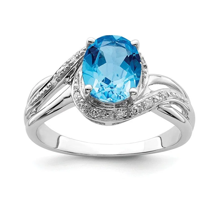 Ladies round glow rings -Sterling Silver Diamond And Oval Swiss Blue Topaz Ring