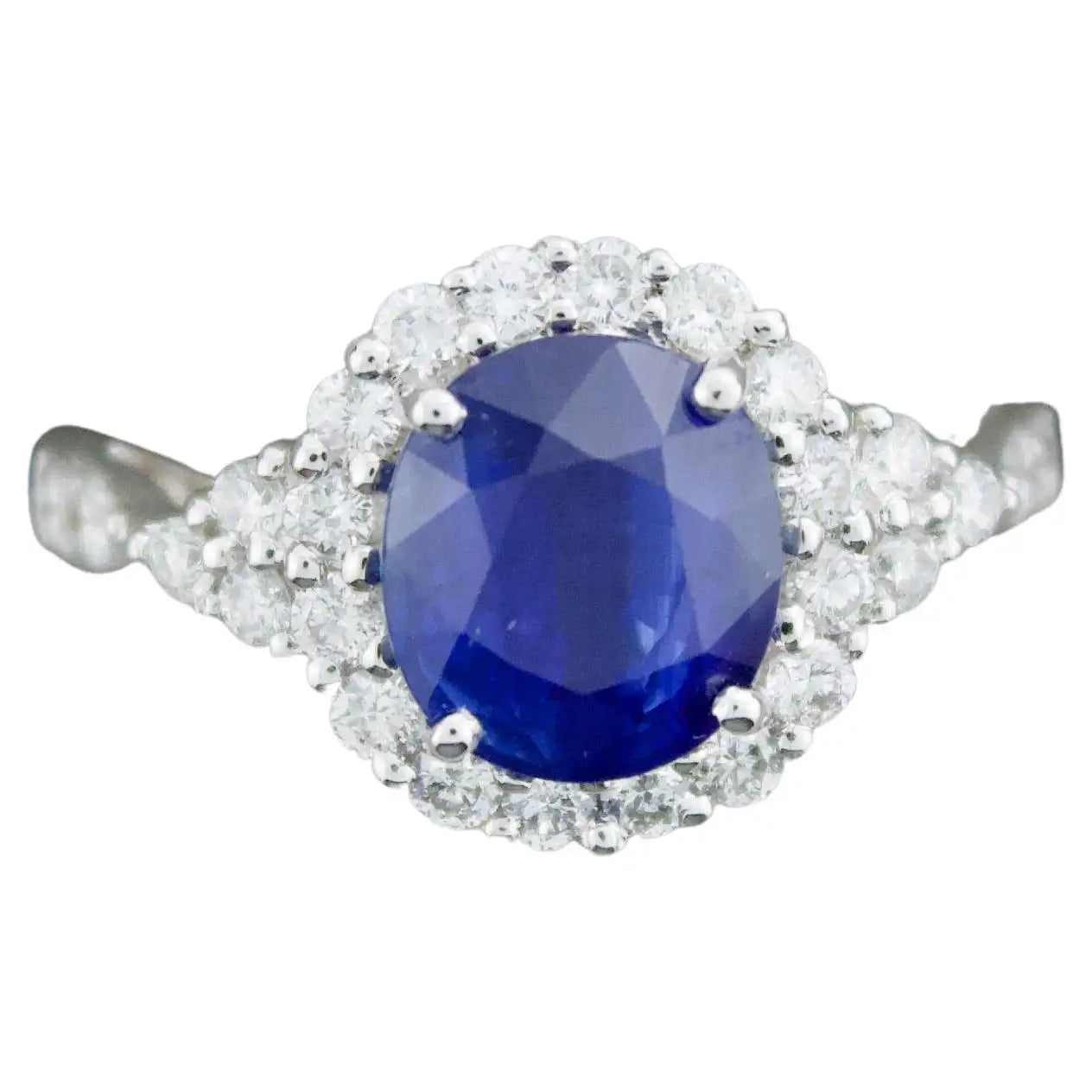 Ladies lone stone rings -Sapphire and Diamond Ring