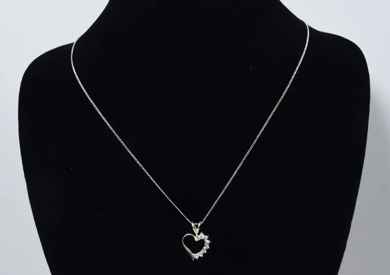 Ladies Necklaces for Elder Spark-Avon - Sterling Silver and Topaz Heart Pendant on Sterling Silver Chain Necklace - 18"