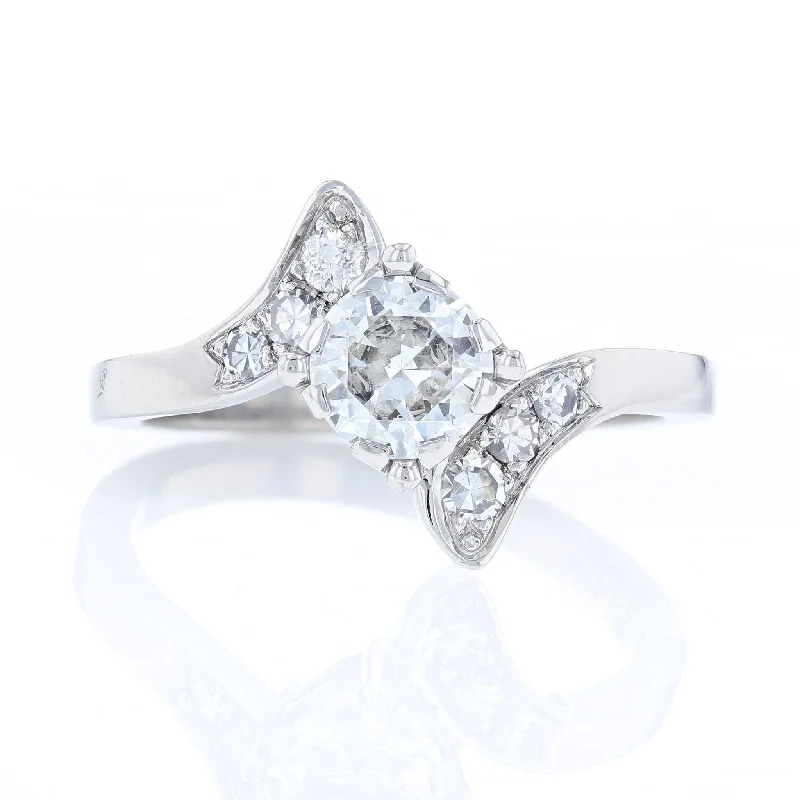 Sleek platinum engagement rings -Platinum Round Diamond Bypass Engagement Ring