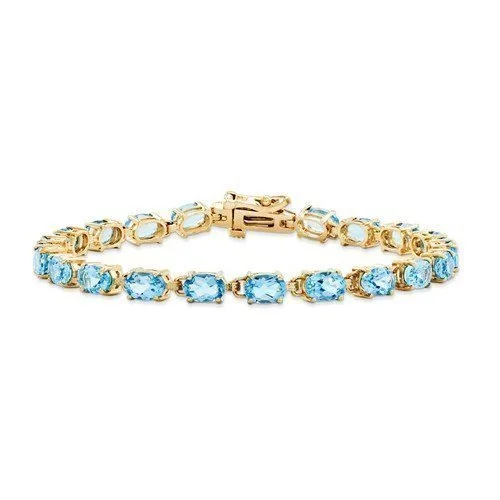 Ladies Bracelets Pure Glow-14KT YELLOW GOLD 11 CARAT SWISS BLUE TOPAZ BRACELET